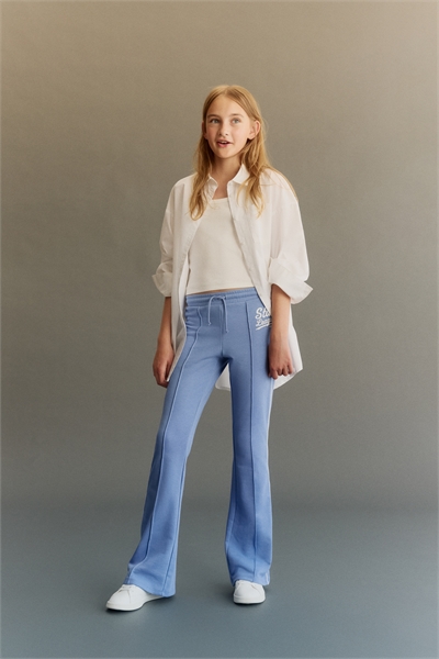 Джоггеры с расклешенными складками на ногах 1297122001