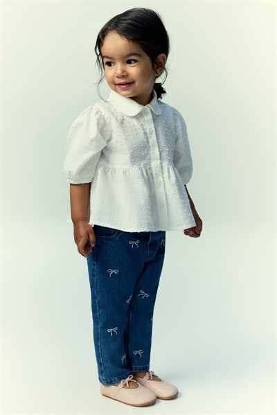 Джинсы с вышивкой 1268386004