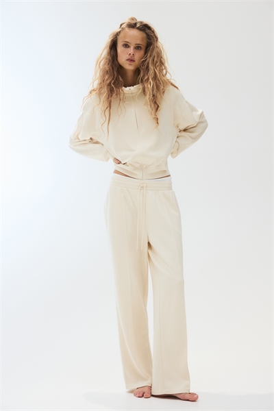 Брюки из супермягкого трикотажа со складками спереди 1299244002