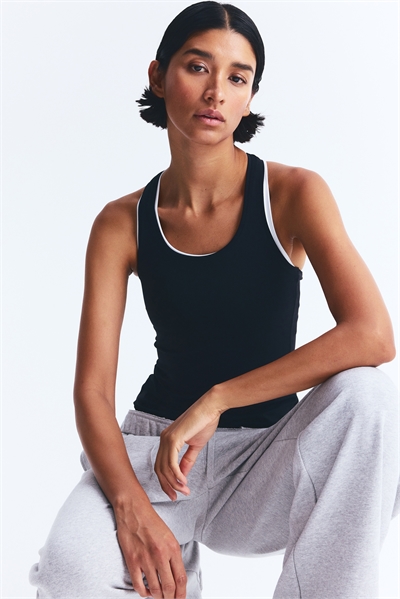 Спортивный топ с Cool Handfeel DryMove™ 1290014005