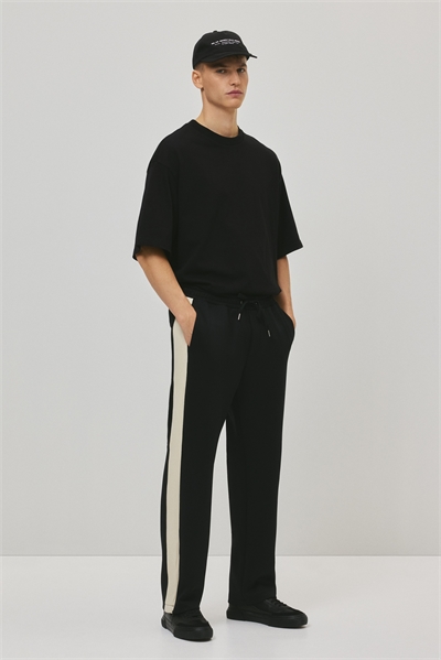 Тренировочные брюки расслабленного кроя с боковыми полосками 1311911001