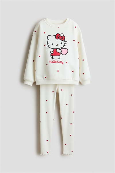 Комплект из двух частей - топа и леггинсов артикул 1229678027