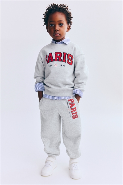 Джоггеры с вышивкой артикул 1308028005