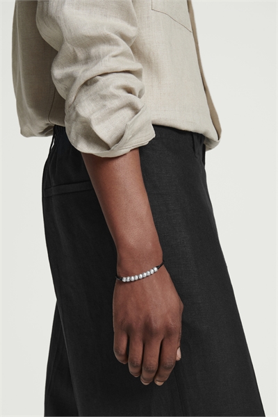 Браслет из кожаного шнура с бусинами артикул 1270898001