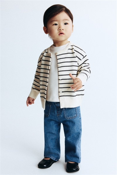 Джинсы расклешенные артикул 1270237010