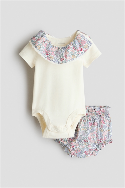 Комплект из 2 предметов: боди и шаровары артикул 1315132001