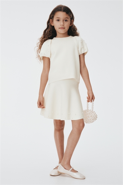 Юбка из тонкого трикотажа с бисерными деталями артикул 1313279002