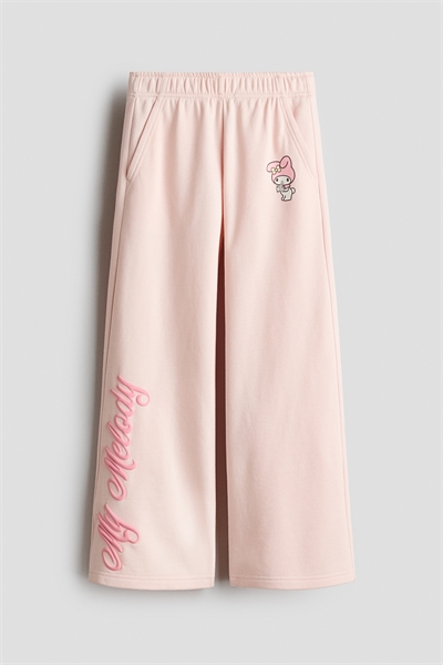 Джоггеры из футера с принтом артикул 1310460004