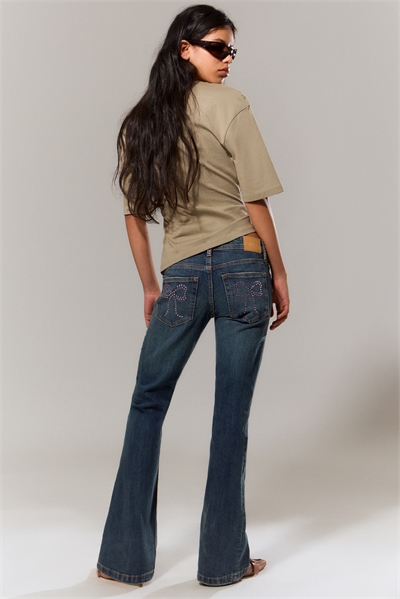 Расклешенные джинсы с низкой посадкой и украшением артикул 1333030001