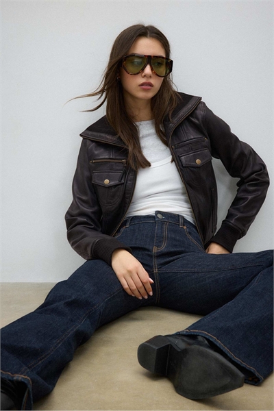 Ребристая комбинированная кожаная куртка черного цвета артикул 155702639