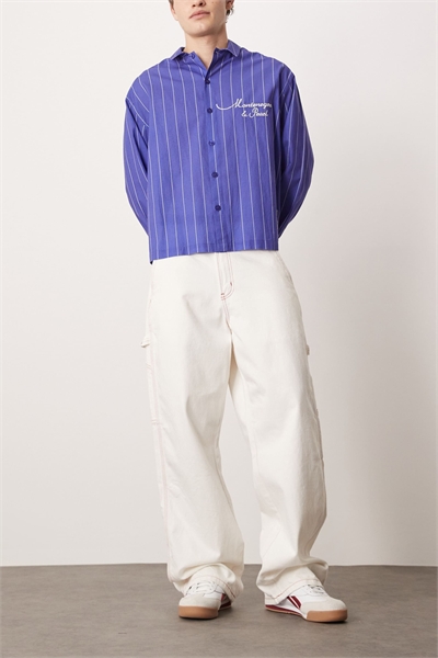 Джинсовые брюки свободного кроя в стиле «карпентер» с контрастной отстрочкой артикул 141861463