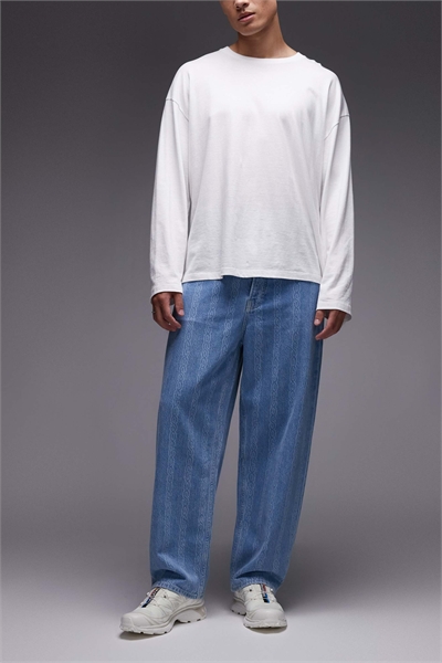 Джинсы свободного кроя с принтом в виде цепной сетки артикул 150481744