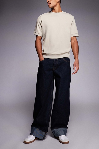 Джинсы-багги средней посадки с отворотами и контрастной строчкой, темно-синего цвета артикул 150202379