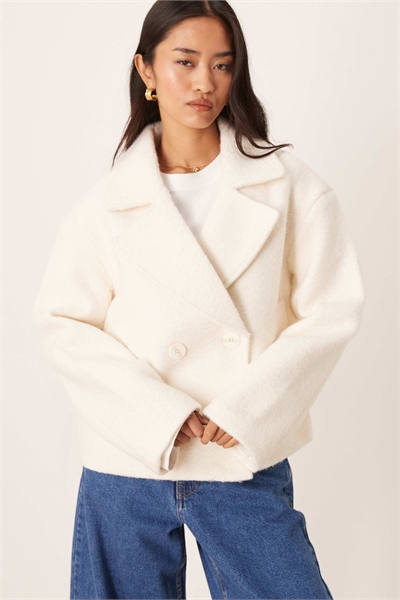 Двубортный укороченный жакет с воротником из шерсти кремового цвета артикул 142720264