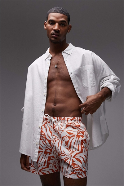 Курортные плавки с завязками на талии, оранжевые с цветочным принтом артикул 154159309