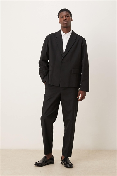 Брюки свободного кроя с зауженными штанинами артикул 150742739