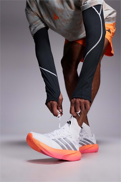 Кроссовки Adidas Running Supernova Rise 3 белого, оранжевого и розового цветов артикул 150040918