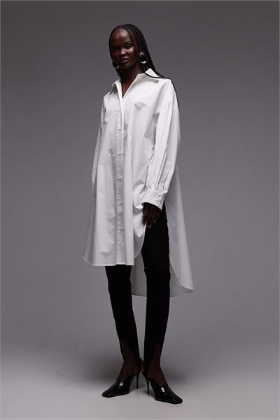 Рубашка свободного кроя с широкими манжетами и удлиненным силуэтом артикул 153286527