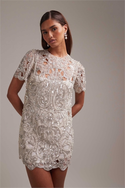 Декоративное мини-платье с вырезами и пайетками цвета слоновой кости артикул 149554176