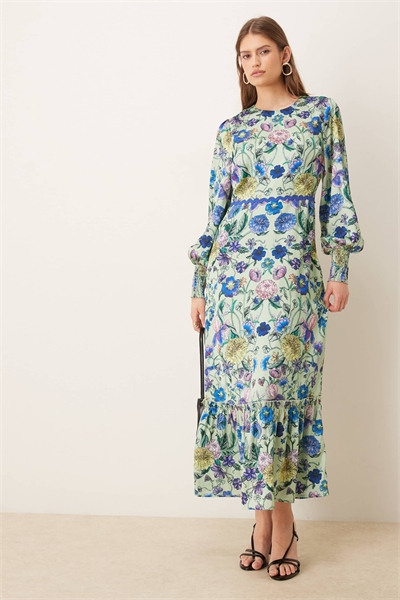 Платье-блузон с длинными рукавами и бантиком на спине, синего цвета с зеркальным цветочным принтом артикул 153329818