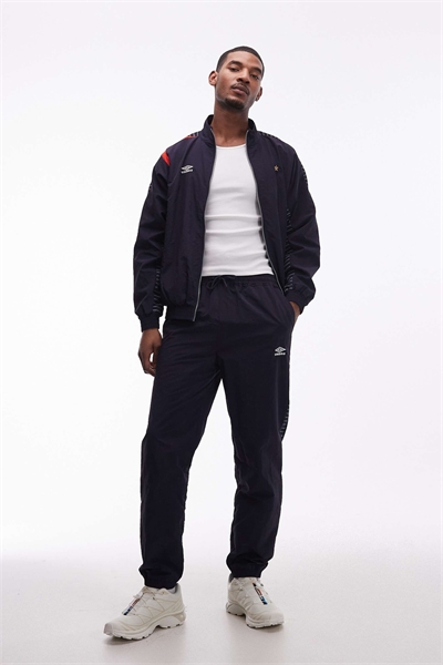 Брюки-треники свободного кроя артикул 154640495