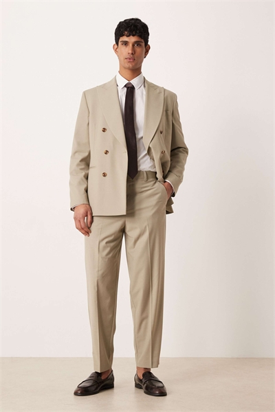 Брюки свободного кроя с зауженными штанинами артикул 153575088