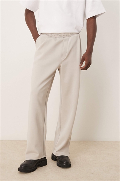 Джоггеры свободного кроя из плотной ткани артикул 143824041