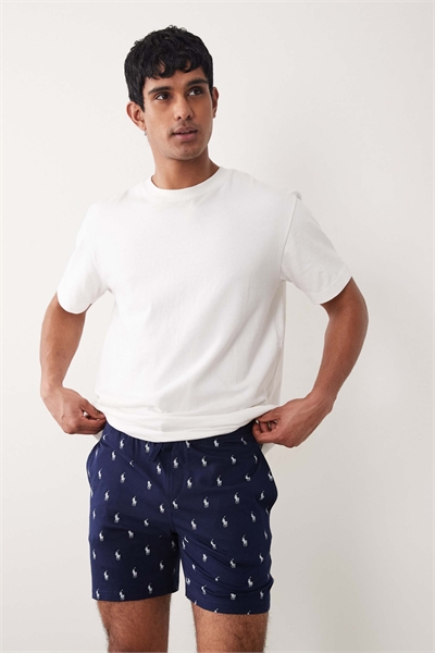 Футболка с логотипом в виде значка по всей поверхности артикул 154158033