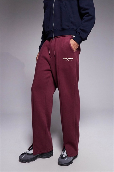 Джоггеры с прямыми брючинами и асимметричным подолом артикул 151306009