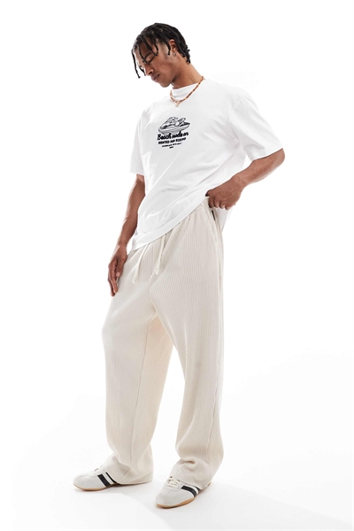 Джоггеры свободного кроя с плиссировкой артикул 140914938