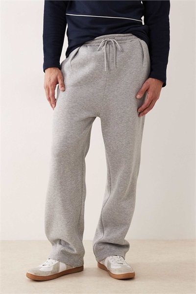 Джоггеры с широкими брючинами и зауженным низом артикул 151859723