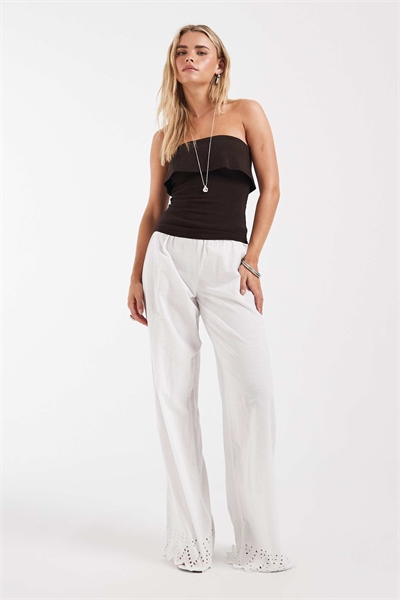 Белые брюки с вышитым подолом артикул 153716168