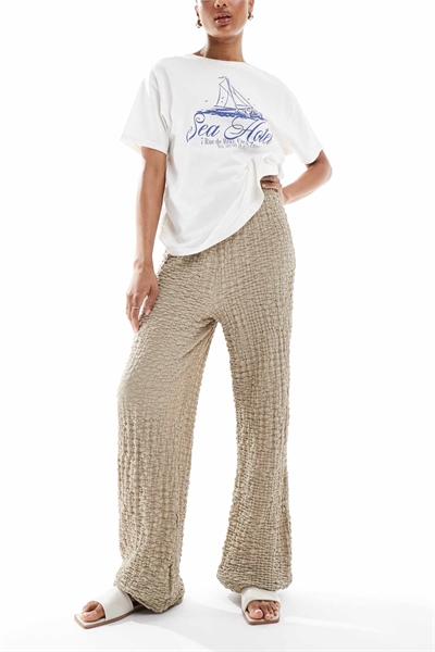 Брюки с широкими штанинами и фактурной поверхностью артикул 140891809