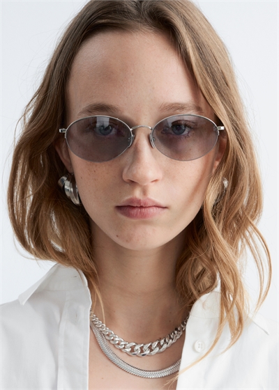 Солнцезащитные очки с круглыми металлическими оправами артикул 1325977002