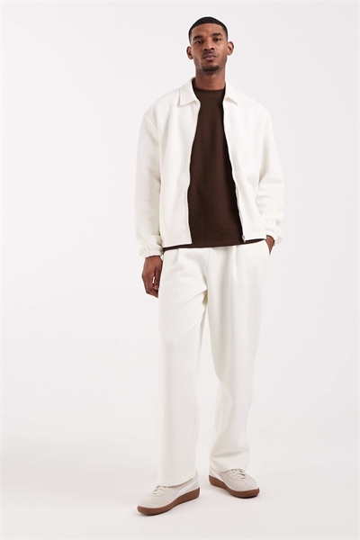 Джоггеры из пике с широкими брючинами артикул 156172528