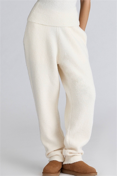 Брюки из шерстяного букле цвета слоновой кости от Geena артикул 155774577