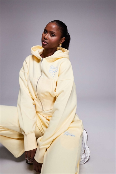 Короткая кофта с капюшоном на молнии, с вышитым логотипом в виде банта, из хлопчатобумажной ткани, в комплекте с брюками, лимонного и голубого цветов артикул 153016930