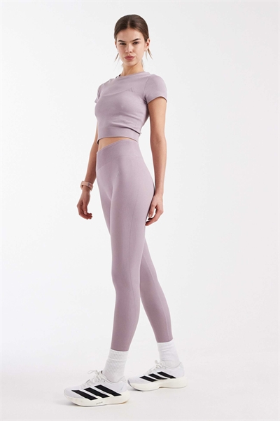 Незаменимый элемент тренировочного гардероба: длинные трикотажные леггинсы артикул 155165072