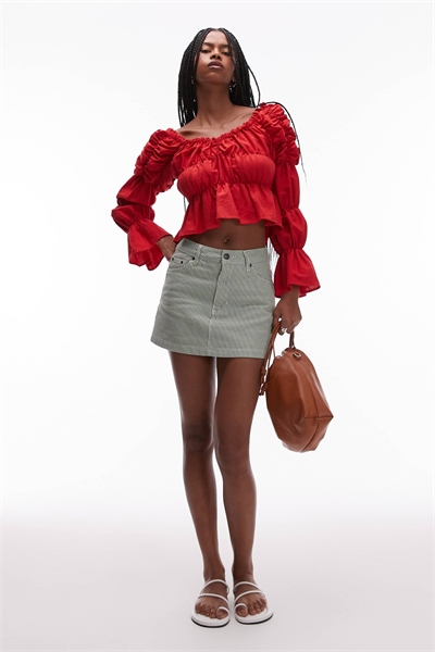 Мини-юбка из джинсовой ткани с оборками артикул 140395565