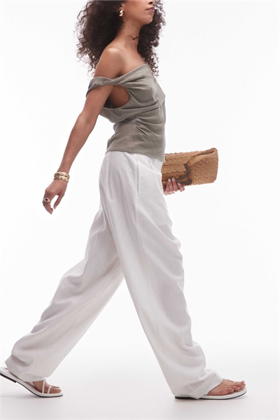 Брюки из льна с расклешенными штанинами артикул 140623636