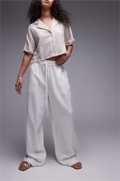 Брюки свободного кроя из марли с эластичным поясом артикул 141528264