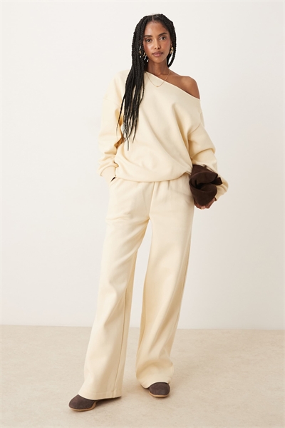 Джоггеры с широкими брючинами и отворотными манжетами артикул 147018336