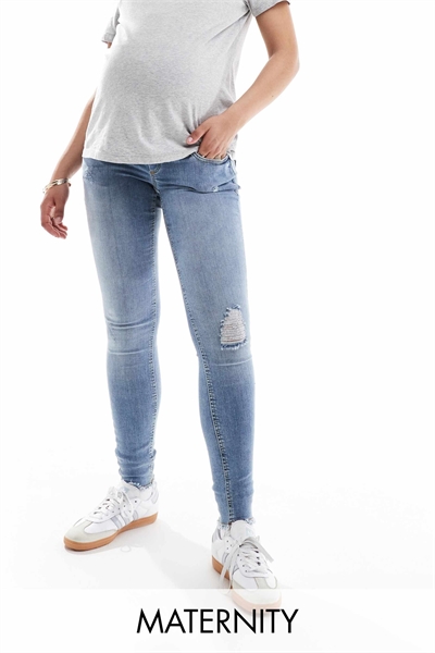 Скинни-джинсы розового цвета с потертостями по краю артикул 135084320