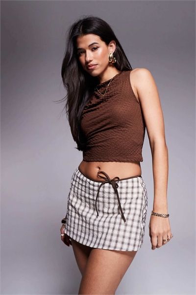 Мини-юбка с бантиком артикул 140373427