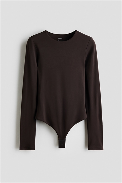 Скульптурирующее боди со стрингами с длинными рукавами артикул 1303490004