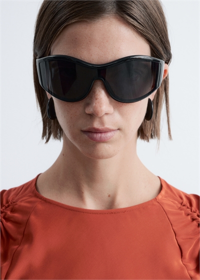 Солнцезащитные очки с овальной оправой артикул 1312324001