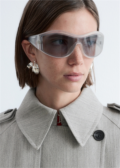 Солнцезащитные очки с овальной оправой артикул 1312324002