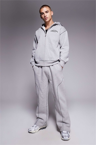 Джоггеры свободного кроя с оверлочной строчкой артикул 151112219