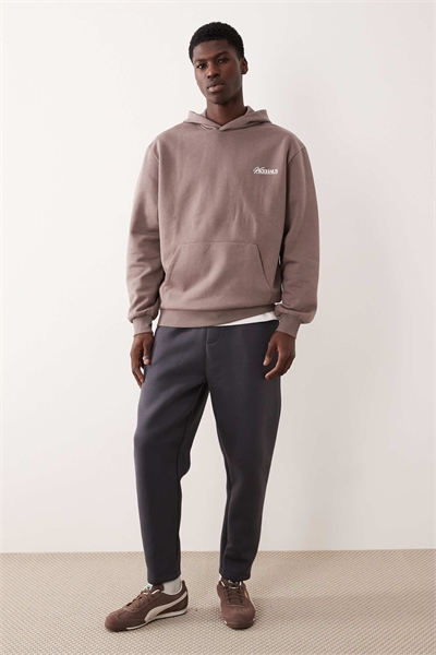 Джоггер с зауженным кроем из плотной ткани артикул 150347324