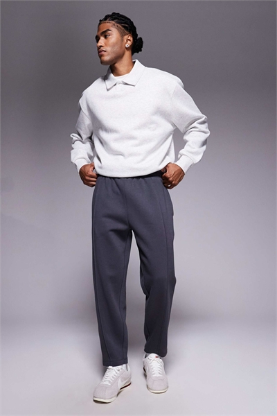 Джоггеры зауженного кроя с мелкими складками артикул 149108994